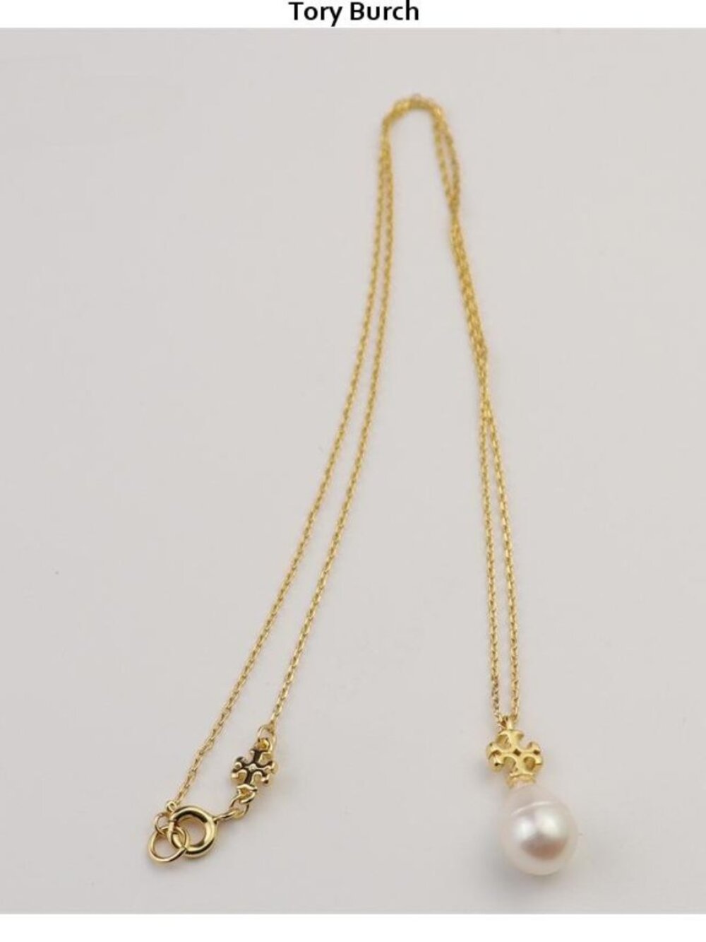 Tory Burch Gold Chain Bracelet with White Pearl Charm